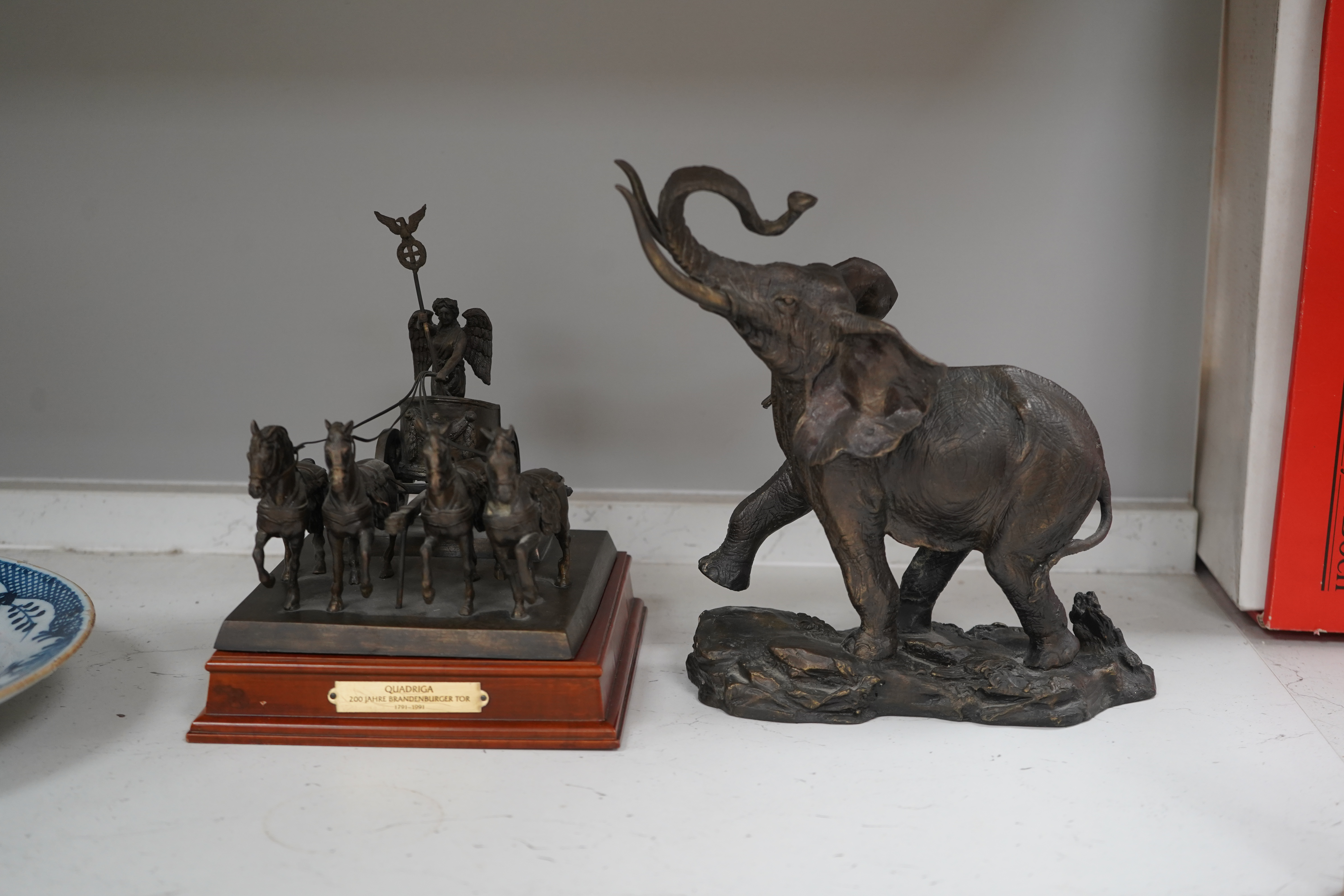 A Franklin Mint bronzed figure of an elephant, 'Giant of the Serengeti', and a Franklin Mint bronzed model 'Quadriga', on wooden plinth, with title plaque, largest 23.5cm. Condition - good